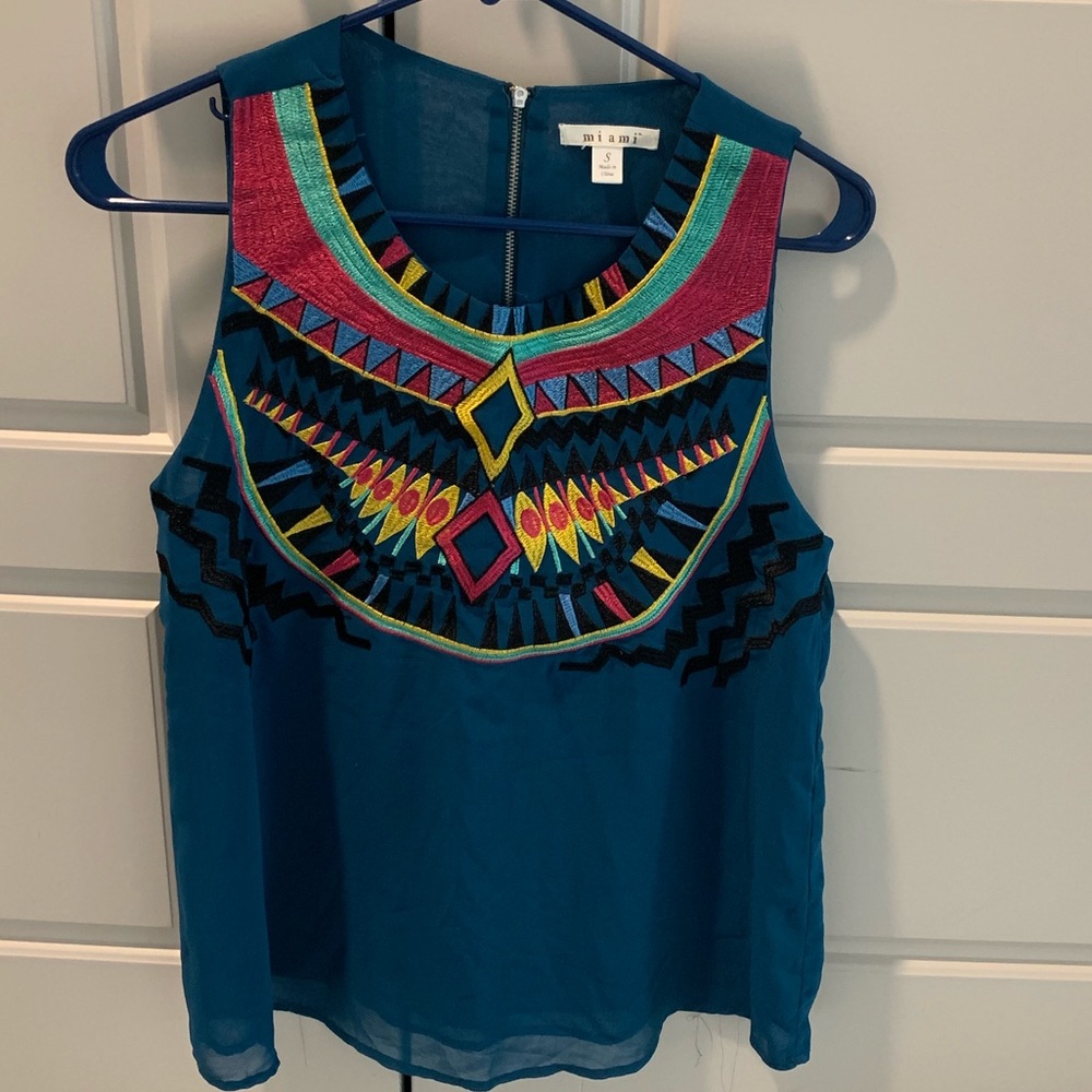 Embroidered blouse.